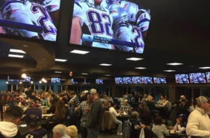 a hall full with people betting on sports